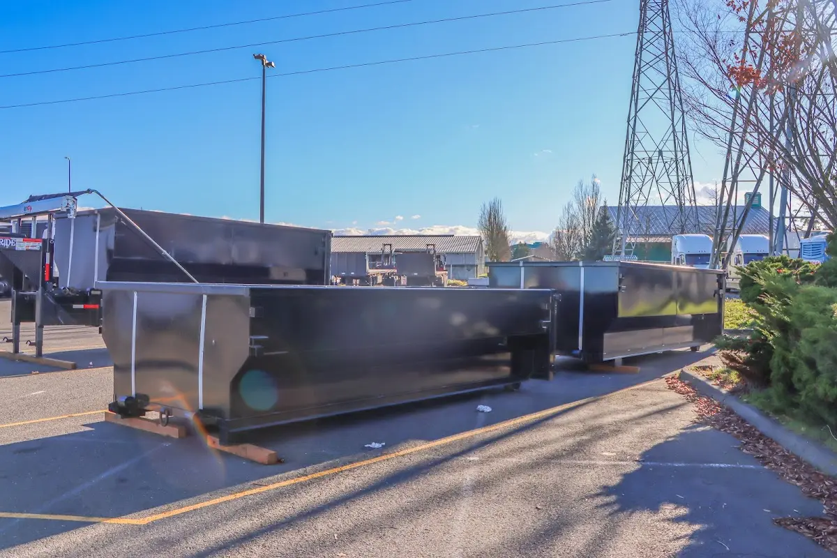 Roll-off dumpster ready for waste disposal at job site for Concrete Dumpster Rental in Dublin